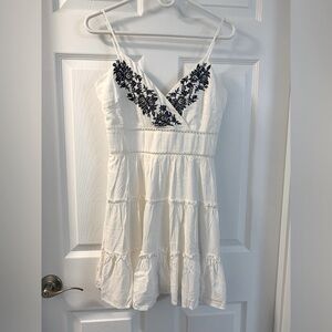 Francesca’s mini sundress with embroidered detail